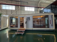 Capsule spatiale préfabriquée, cabine conteneur, installation rapide, maison modulaire compacte, unité de cuisine intégrée, bureau préfabriqué facilement déplaçable