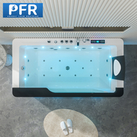 Baignoire de massage à remous avec jets d'air colorés Design moderne pour le trempage pour les hôtels ou les salles de bain comprend un robinet d'égouttage