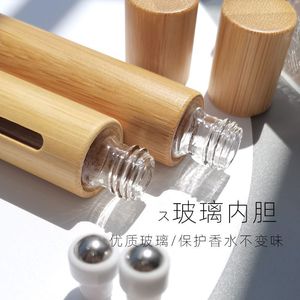 ขวดแก้วทรงกลมหุ้มไม้ไผ่ ขนาด 5 มล. 10 มล. สำหรับบรรจุน้ำมันหอมระเหย พร้อมฝาไม้ ดีไซน์หน้าต่างใส เหมาะสำหรับทุกสภาพผิว - Product Image 2