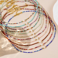 Collier artisanal en perles de rocaille avec pendentif perle d'eau douce, collier ras du cou bohème, bijoux perlés pour femme, tendance