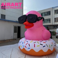 Canard gonflable rose, canard gonflable d'anneau de natation de lunettes noires pour la publicité