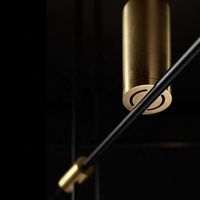Nouvel arrivage de lustre linéaire moderne simple en laiton et cuivre de style nordique éclairage de table d'îlot de cuisine noir pour un restaurant
