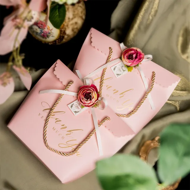 กระเป๋าของขวัญแต่งงานลูกกวาดสีชมพูออกแบบริบบิ้นโบว์คริสต์มาสขอบคุณถุงกระดาษสำหรับของขวัญแต่งงาน