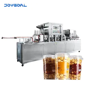 Automatic double depositor cup filling and sealing machine roll film
