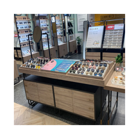 Vitrine en bois robuste et étanche avec éclairage LED personnalisé pour la vente au détail de lunettes de soleil, bijoux, téléphones, optiques, mobilier de magasin