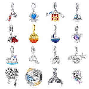 PANBUEATY Dije con Dijes de Moda para Mujer Motivo Océano con Delfín, Tortuga Marina, Sirena y Cangrejo Ermitaño en Aleación de Cobre Bañada en Plata con Circón, Ideal para Regalo - Product Image 1