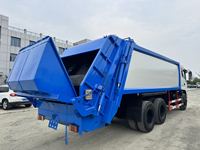 Camion à ordures compacteur d'occasion de 20 mètres cubes à double essieu arrière, châssis Dongfeng, moteur Yuchai, boîte de vitesses rapide à 8 rapports avec réservoir d'eaux usées