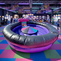 Jeu de sport gonflable interactif jeu d'essuyage tour mécanique sur roue de diables gonflables