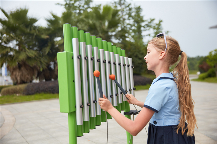 Green metal musical playground
