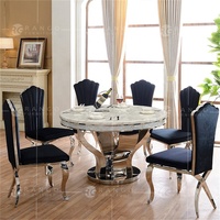 Ensemble de salle à manger avec table ronde en marbre de 120 cm et 6 chaises en cuir véritable