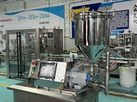 Machine de remplissage semi-automatique haute précision pour beurre de cacahuète et sauces visqueuses avec trémie sous vide