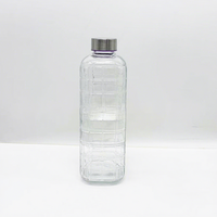 Bouteille d'eau en verre sodocalcique texturé gaufré de grande capacité 1000 ml