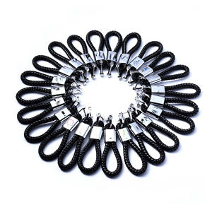 Vente en gros de porte-clés en métal avec corde en cuir PU tissé à la main porte-clés de voiture en cuir sac Opp en alliage de zinc porte-clés en cuir porte-clés léger - Product Image 1