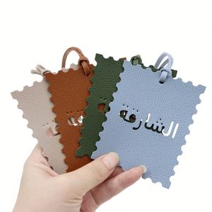 Bolso de mano Sharjah cuadrado con texto árabe, estilo desierto de Oriente Medio, colgante decorativo, llavero para coche, amuleto para bolso - Product Image 1