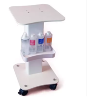 Chariot de rangement moderne pour salon de beauté avec base à petites bulles et roulettes robustes