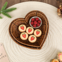 Hartvormig minimalistisch landelijk multifunctioneel handgemaakt PP rotan dienblad voor gedroogd fruit, afternoon tea en bureau-opbergruimte