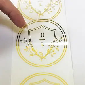 Custom round transparent PVC label Waterproof Roll White ink text Clear Vinyl Label self adhesive clear gold foil sticker