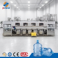 Ligne de production complète pour usine d'eau : Machine de remplissage automatique 900 BPH pour bonbonnes de 5 gallons avec rinçage, remplissage et bouchage – Approvisionnement direct usine