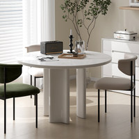 Table à manger moderne avec plateau en pierre frittée ronde, base incurvée à trois pieds, couleur crème, pour la maison, le restaurant, la villa