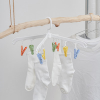 Cintre de séchage en forme de croix avec 8 pinces colorées en plastique PP pour chaussettes, sous-vêtements, pantalons, jupes