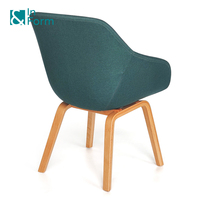 Chaise de loisirs rembourrée en mousse de moisissure vert noirâtre au design moderne Fauteuil à coque incurvée avec pieds en bois courbé
