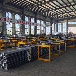 La machine à tubes à ailettes en spirale comporte une compensation automatique pour l'usure des outils. - Product Image 5