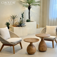Chaise d'extérieur moderne avec dossier en corde tressée et coussins pour jardin, terrasse et villa