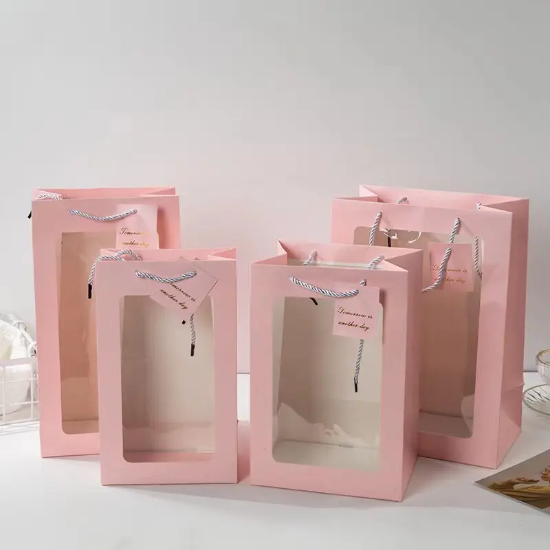 Emballage recyclable avec logo personnalisé Caractéristique Sac cadeau de Noël avec fenêtre en PVC transparent Sacs en papier