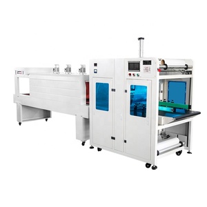Machine d'emballage et de conditionnement entièrement automatique pour barquettes en carton, boîtes en carton et manchons, avec film rétractable PE et convoyeur à bande - Product Image 1