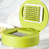 Handmatige knoflookpers met opvangbak, roestvrijstalen knoflooksnijder, handmatige gemberstamper, duurzaam fruit- en groentegereedschap