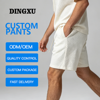 Shorts en tricot matelassé pour homme, couleur crème, taille élastique avec cordon de serrage, poches fendues, coupe ample, longueur mi-cuisse, pour la terrasse