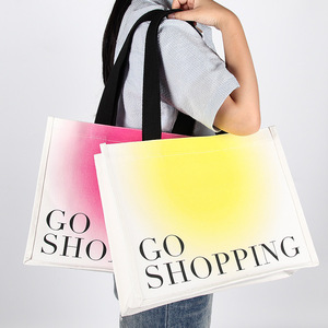 กระเป๋าผ้าแคนวาสพับได้แบบขายส่ง เป็นมิตรกับสิ่งแวดล้อม สีไล่ระดับ พิมพ์โลโก้ตามสั่ง สำหรับบรรจุเสื้อผ้า ถุงเท้า และสินค้าอื่นๆ - Product Image 1