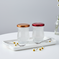 Bocaux en verre carrés de 50 ml à 200 ml en gros avec couvercle métallique, diffuseur à bâtonnets, logo personnalisé, sans BPA, écologiques, pour aliments pour bébés, gelée, gâteaux, chocolat