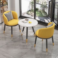 Ensemble de table et chaises de salon de style nordique en métal de luxe avec rangement mobile pour hôtel et maison d'hôtes