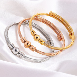 Bracelet en fil de câble en acier inoxydable fin, best-seller, bijou torsadé pour femmes et hommes - Product Image 1