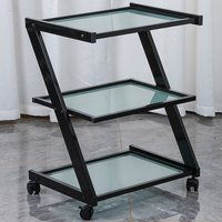 Nouveau tabouret de salon de coiffure moderne noir en acier inoxydable à roulettes à vendre