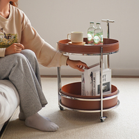 Table d'appoint mobile moderne en cuir pleine fleur de style italien minimaliste, avec cadre en acier inoxydable, chariot de rangement verrouillable pour salon