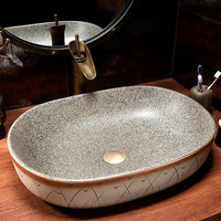 Jingdezhen Cerámica Arte Oem & Odm Hotel Moderno Fregadero Lavabo Setaria Patrón Forma ovalada Fregaderos de baño para la venta