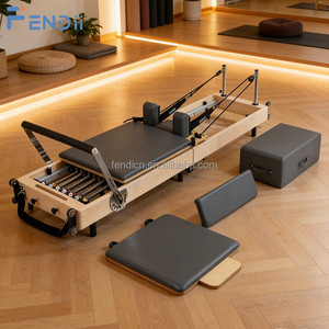 Cama de Pilates Reformer Plegable de Madera de Arce y Roble con Resistencia Ajustable para Gimnasio en Casa y Uso en Estudio - Product Image 1