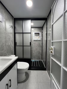 บ้านสำเร็จรูปเหล็กโครงสร้างเหล็กยุคใหม่แบบขยายได้ ขนาด 20 ฟุต/40 ฟุต พร้อมห้องน้ำ ห้องครัวในตัว กันน้ำ ใช้พลังงานแสงอาทิตย์ เหมาะสำหรับสำนักงานเคลื่อนที่ - Product Image 4