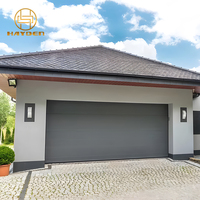 Porte de garage sectionnelle automatique haut de gamme en acier coloré avec télécommande, isolation en mousse PU économe en énergie, panneau lisse