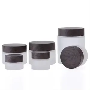 5ml 10ml 20ml 30ml 50ml Matte Frosted Black Amber Glass Cream Jars With Bamboo Plastic Cover Glass Bottles With Bamboo Lid