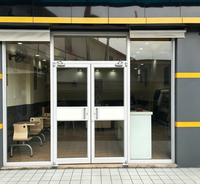 Porte d'entrée double battante robuste en alliage d'aluminium blanc sur mesure, style KFC, pour restaurant de restauration rapide