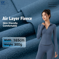 Tissu tricoté chaud en nylon 300g haute élasticité avec couche d'air brossée pour vêtements de yoga automne-hiver et pantalons effet peau de requin