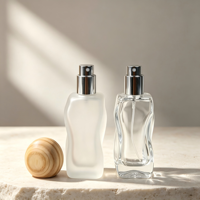 Flacon de parfum cylindrique au design unique, 100 ml, flacon de parfum en verre transparent facetté avec logo personnalisable de luxe et boîte