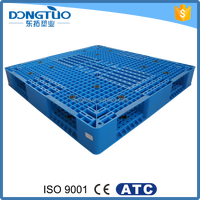 Palettes en plastique industrielles réversibles à 4 entrées, perforées, antidérapantes et durables, pour l'empilage au sol