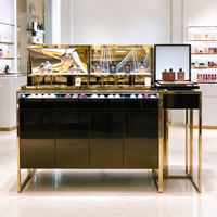 Vitrine de présentation cosmétique noire et or, comptoir îlot, vitrine à parfums en verre, boîte lumineuse, armoires murales pour grand magasin CE ETL