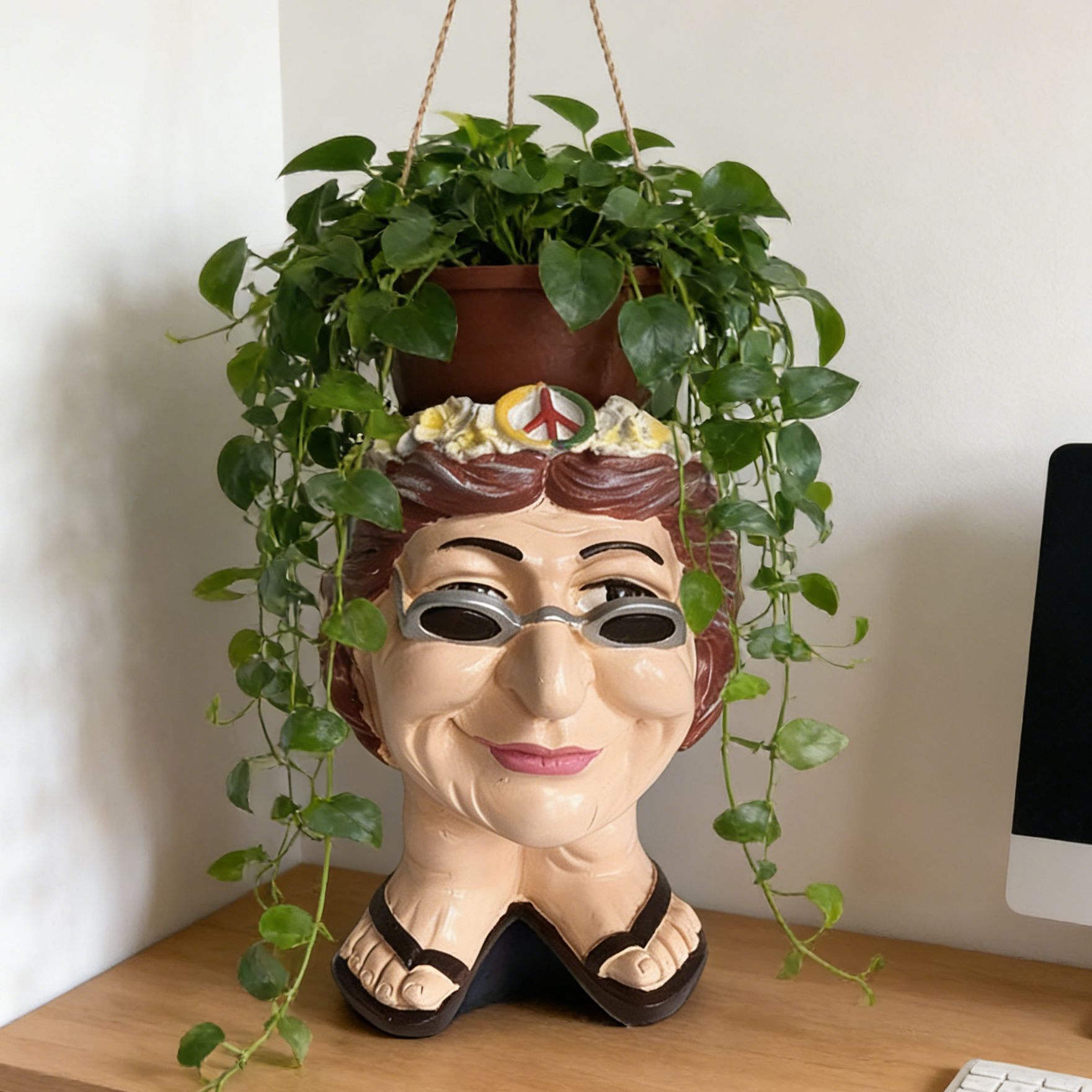 Maceta colorida de niña muggle