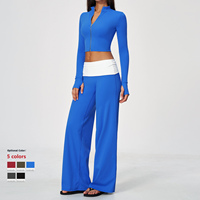 Nouvel ensemble de yoga 2 pièces 2026 à col montant et fermeture éclair, pantalon taille haute légèrement évasé color block, tenue de sport décontractée pour la gym