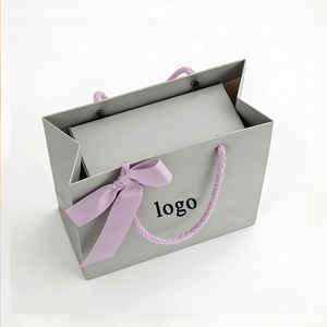 Factory Direct Customizable Free Design Ribbon Decor Coated Paper <b>Bag</b> Sturdy Ideal for Luxury <b>Gift</b> Packaging - Product Image 1